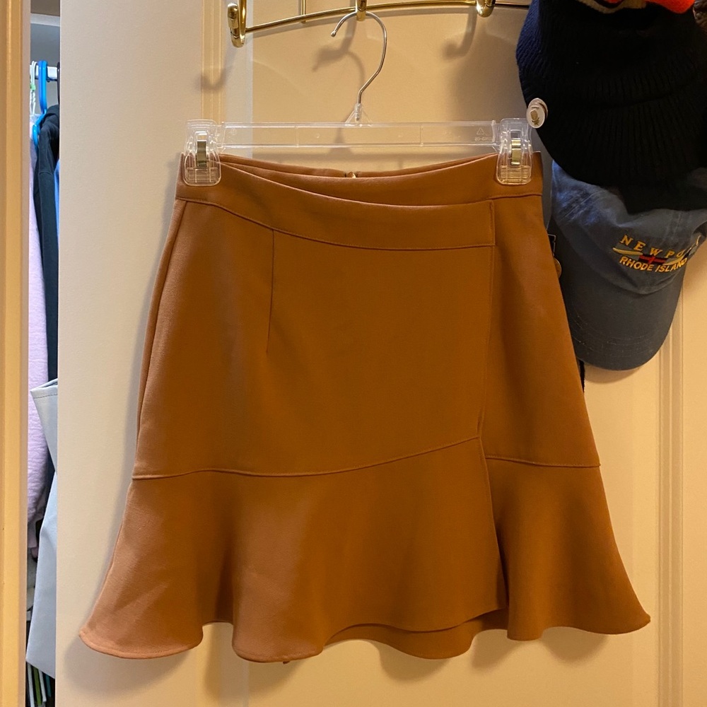 Tan asymmetric mini skirt
